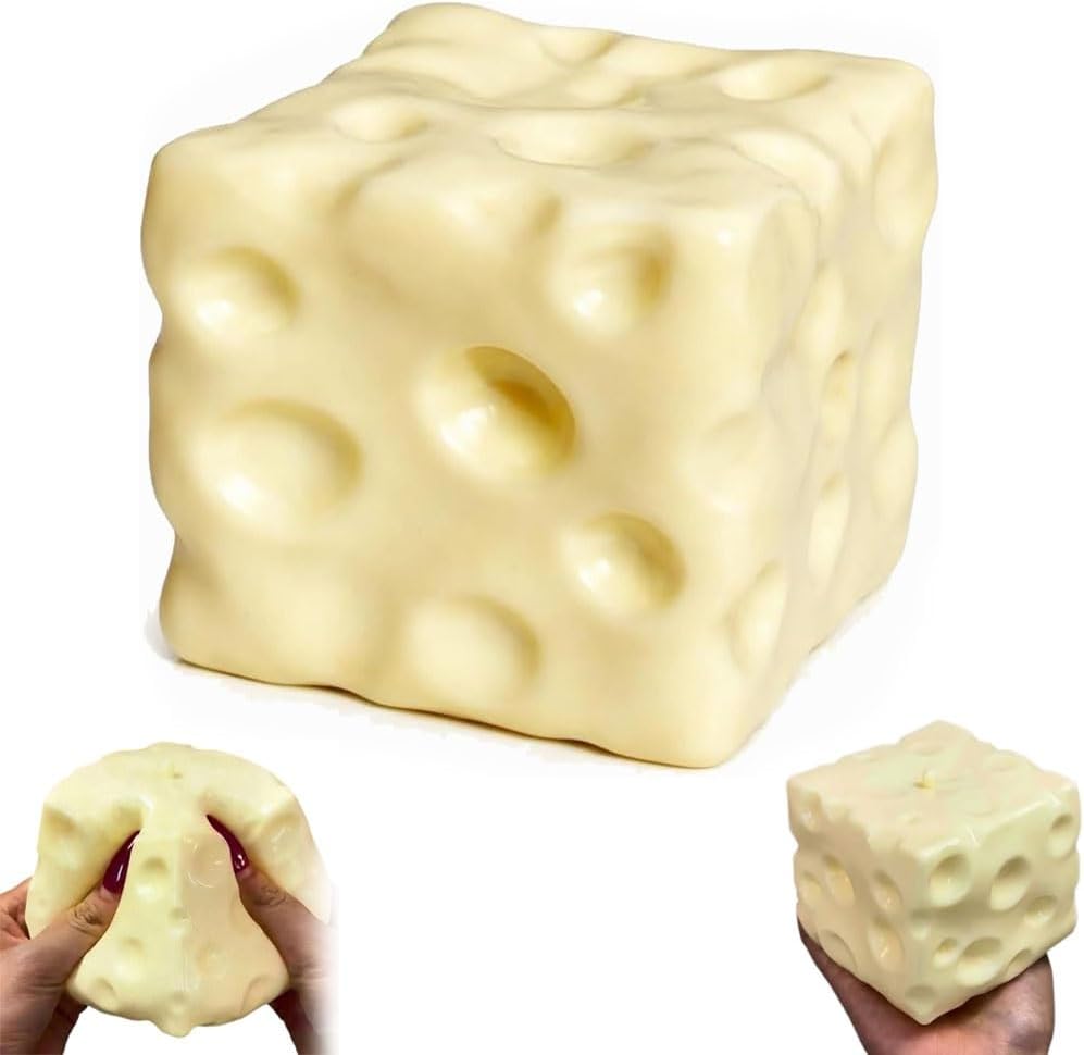 Cream beige cheese squishy cube on a white background