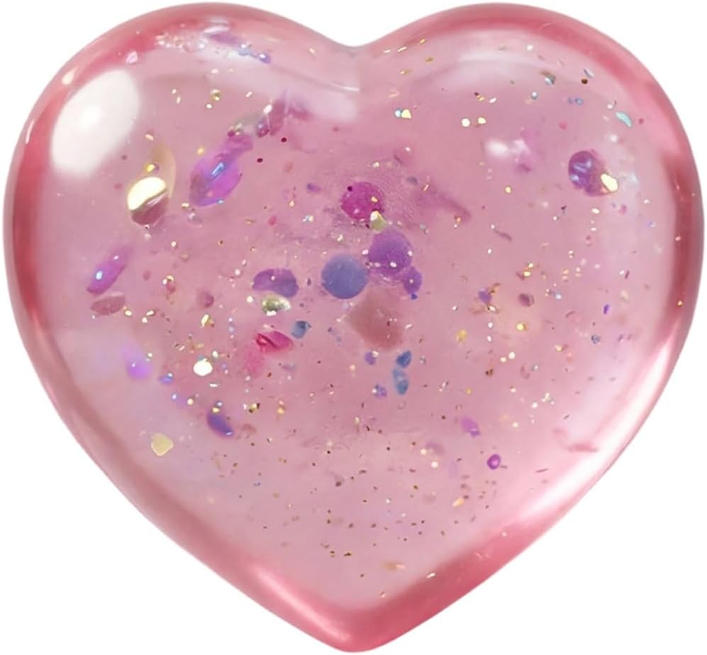 Pink heart squishy with iridescent confetti and glitter inside