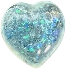 Aqua heart squishy filled with silver glitter and sugar beads