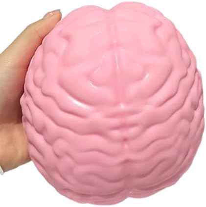 Giant pink brain squishy soft squeeze toy held in hand