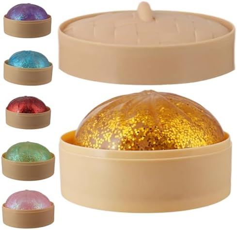 Gold glitter dumpling squishy in a steamer basket