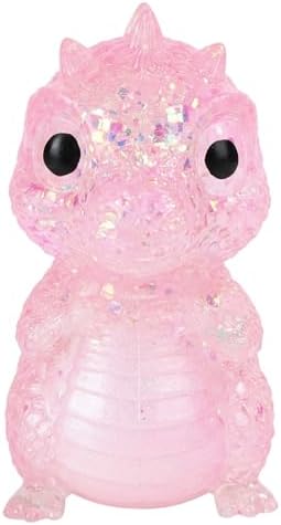Four glitter dinosaur squishy fidget toys in bright colors
