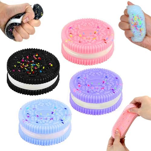 Four pastel sandwich cookie squishy toys with sprinkles