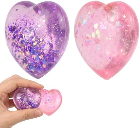 2 pack pink and purple glitter heart squishy balls