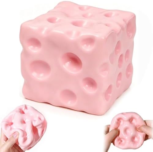 Pink pastel cheese squishy cube on a white background