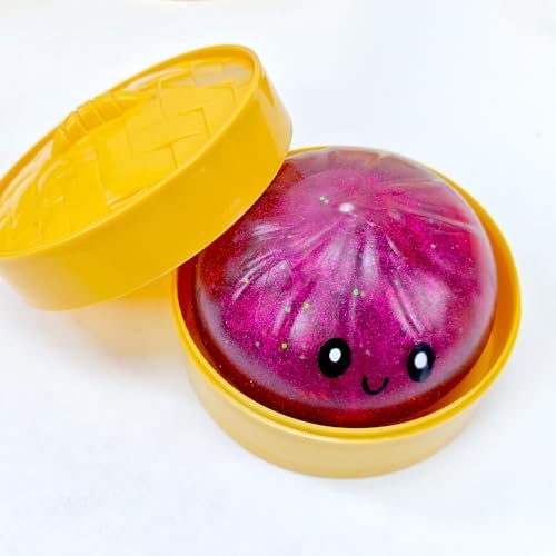 Raspberry glitter dumpling squishy in a gold steamer basket