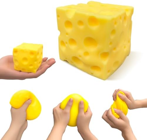 Yellow cheese squishy cube with smaller cube on white