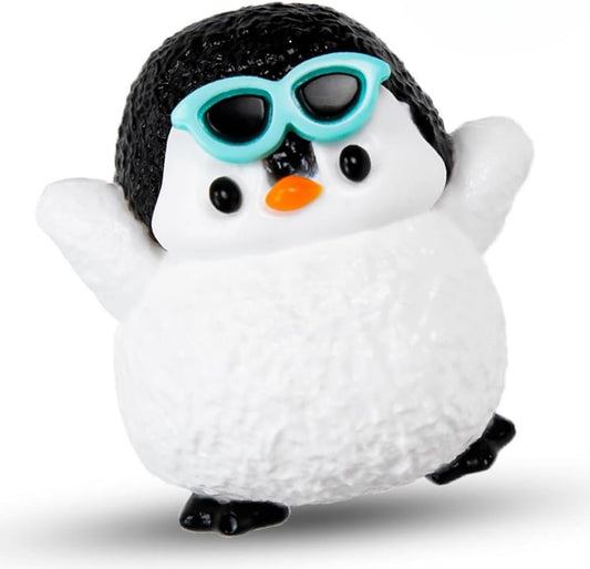 Penguin squishy wearing teal sunglasses, slow rising squeeze toy