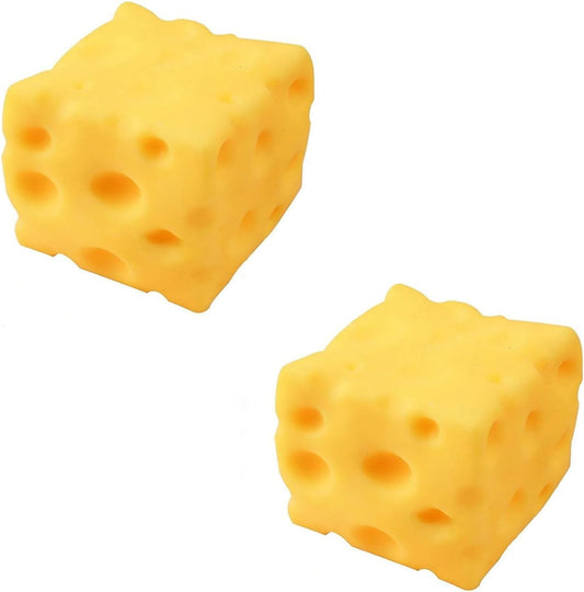 Two yellow cheese squishy holey cubes