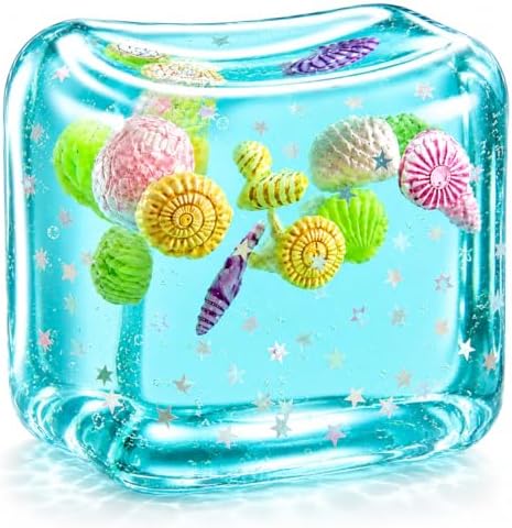 Jumbo blue ice cube squishy with star glitter and seashells