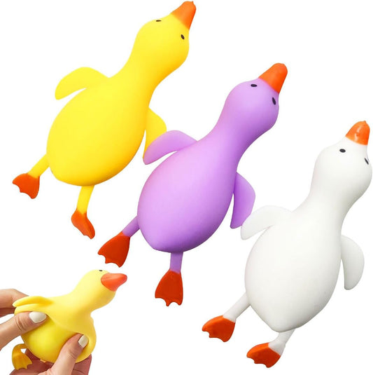 Three pack yellow purple white duck squishy fidget set