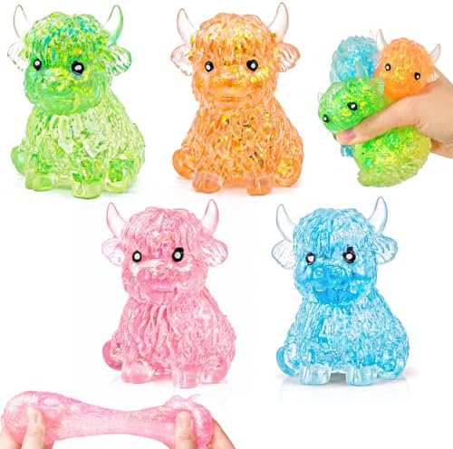Four pack glitter highland cow squishy slow rising fidget toy set