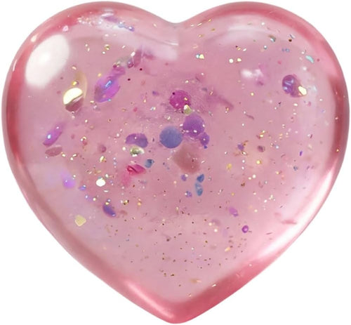 Pink heart squishy with iridescent confetti and glitter inside