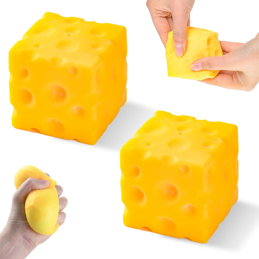Two golden cheddar cheese squishy cubes