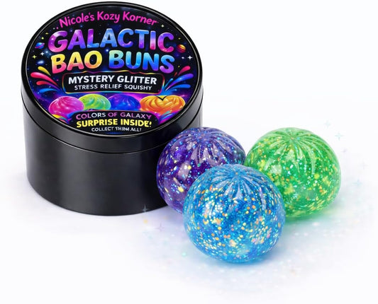Three glitter galaxy squishy ball orbs with a tin