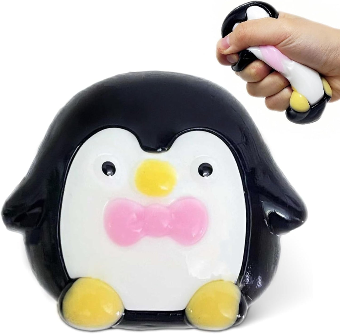 Black and white penguin squishy with a pink bow tie