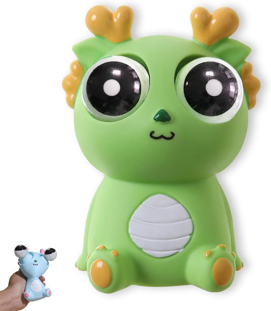 Green dragon squishy pop-out eye stress toy on white background