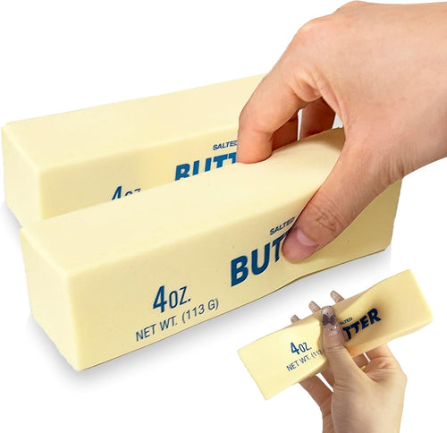 Two stacked yellow butter stick squishies