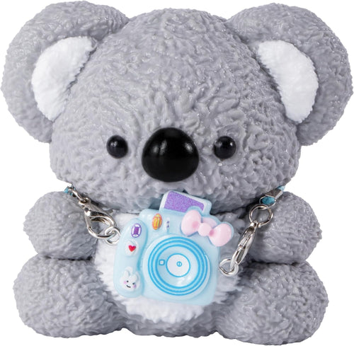 Kawaii koala squishy holding a camera on a white background