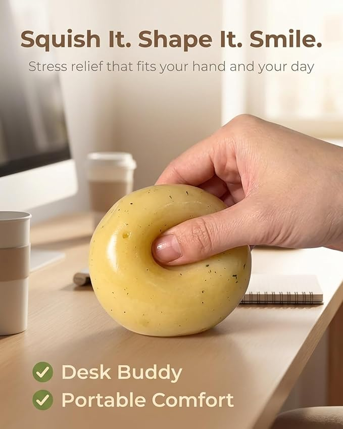 Squishing the mashed potato stress toy at a desk, a portable desk buddy