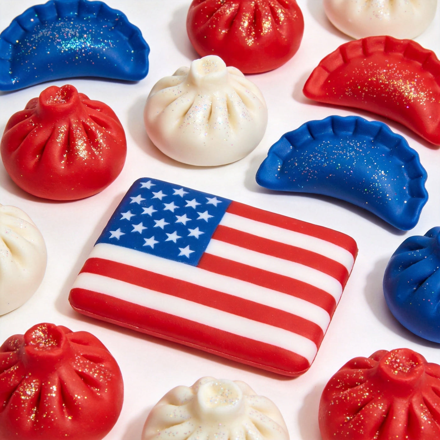 Patriotic red, white, and blue dumpling squishies with glitter accents