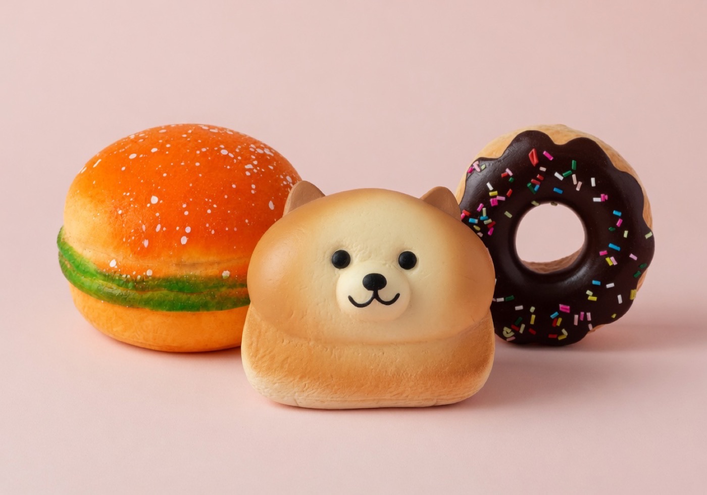 Food-shaped slow-rising squishy toys including cake, toast, and donuts