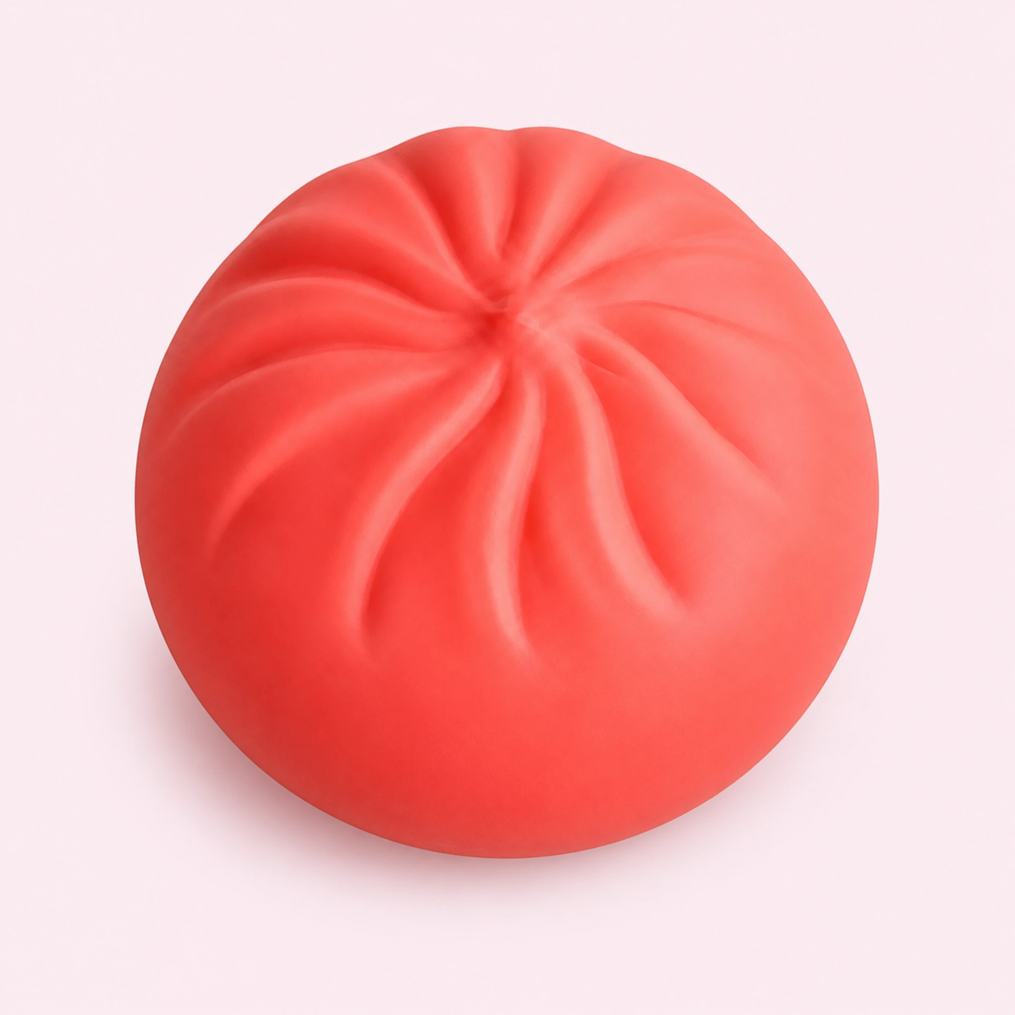 Coral dumpling squishy — desk companion scene
