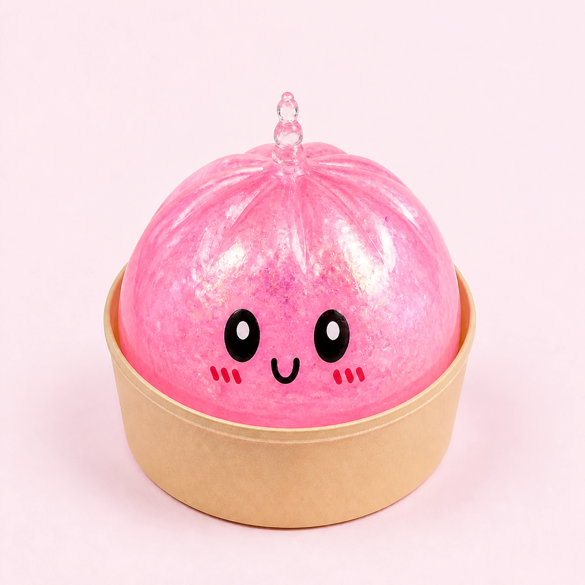 Pink glitter dumpling squishy main image on a pale pink background