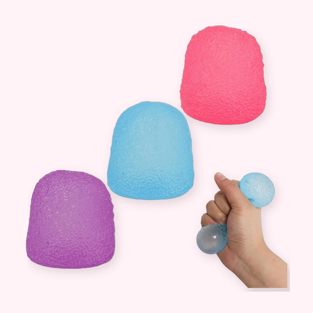 Three colorful candy squishy squeeze stress balls