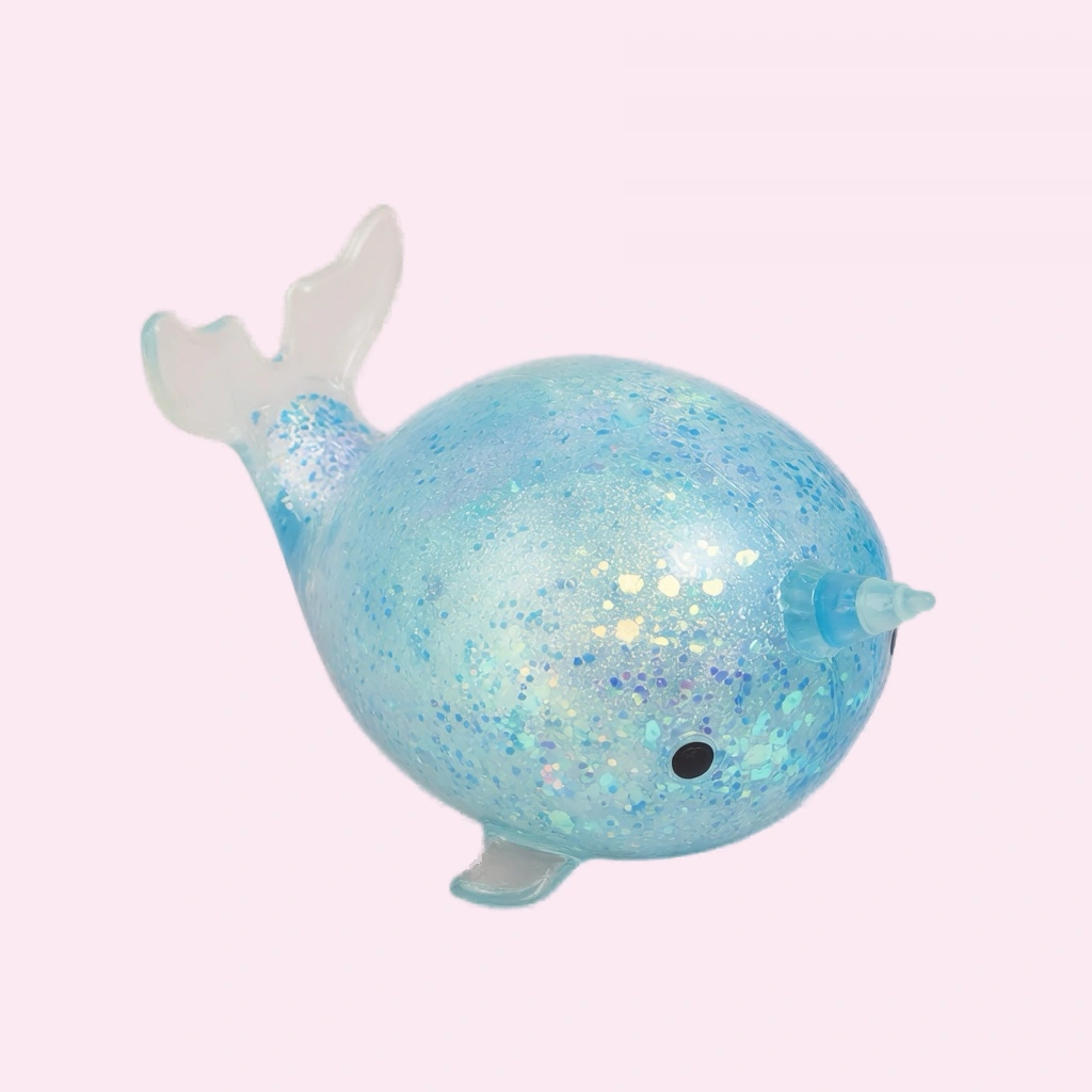 Blue glitter whale squishy stress toy