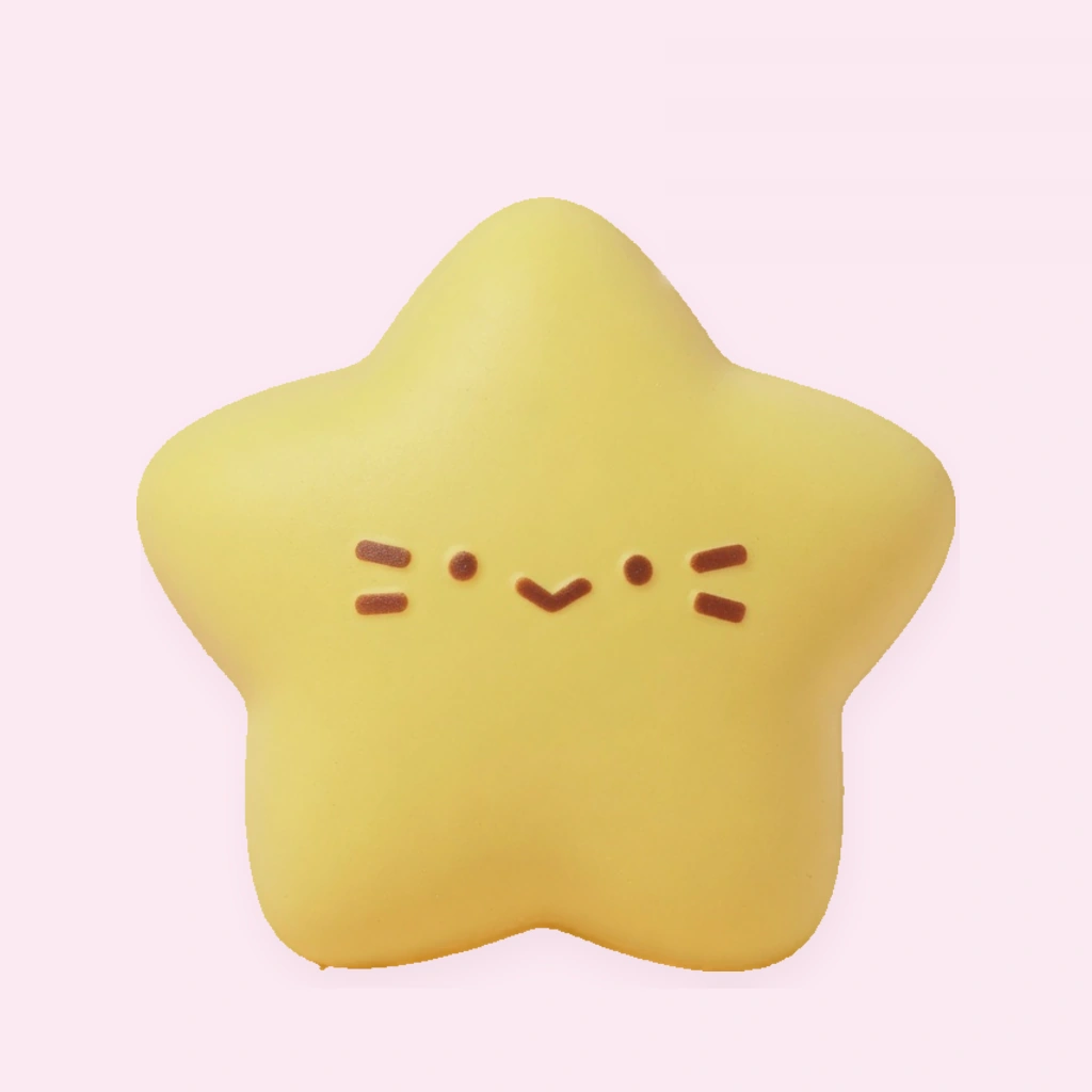 Kawaii yellow lucky star slow rising squishy held in hand