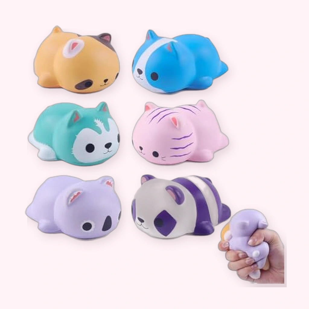 Soft panda squishy and five animal friends with a hand squeezing one
