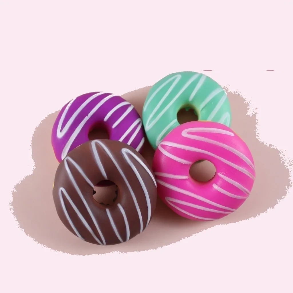 4 Pack Donut Squishy, Scented Slow-Rise Memory Foam shown as a current donut squishy example