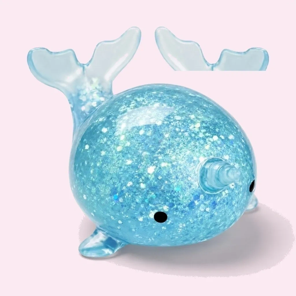 Glitter Narwhal Squishy Blue Slow Rising Squeeze Toy shown as a current narwhal squishy example