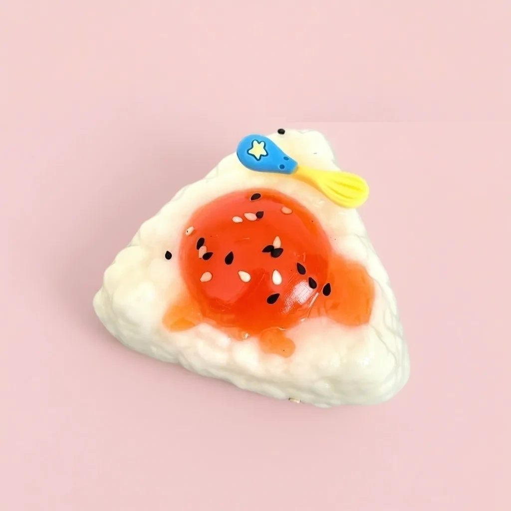 Mini Rice Ball Squishy Cute Squeeze Toy for Party Favors shown as a current rice ball squishy example