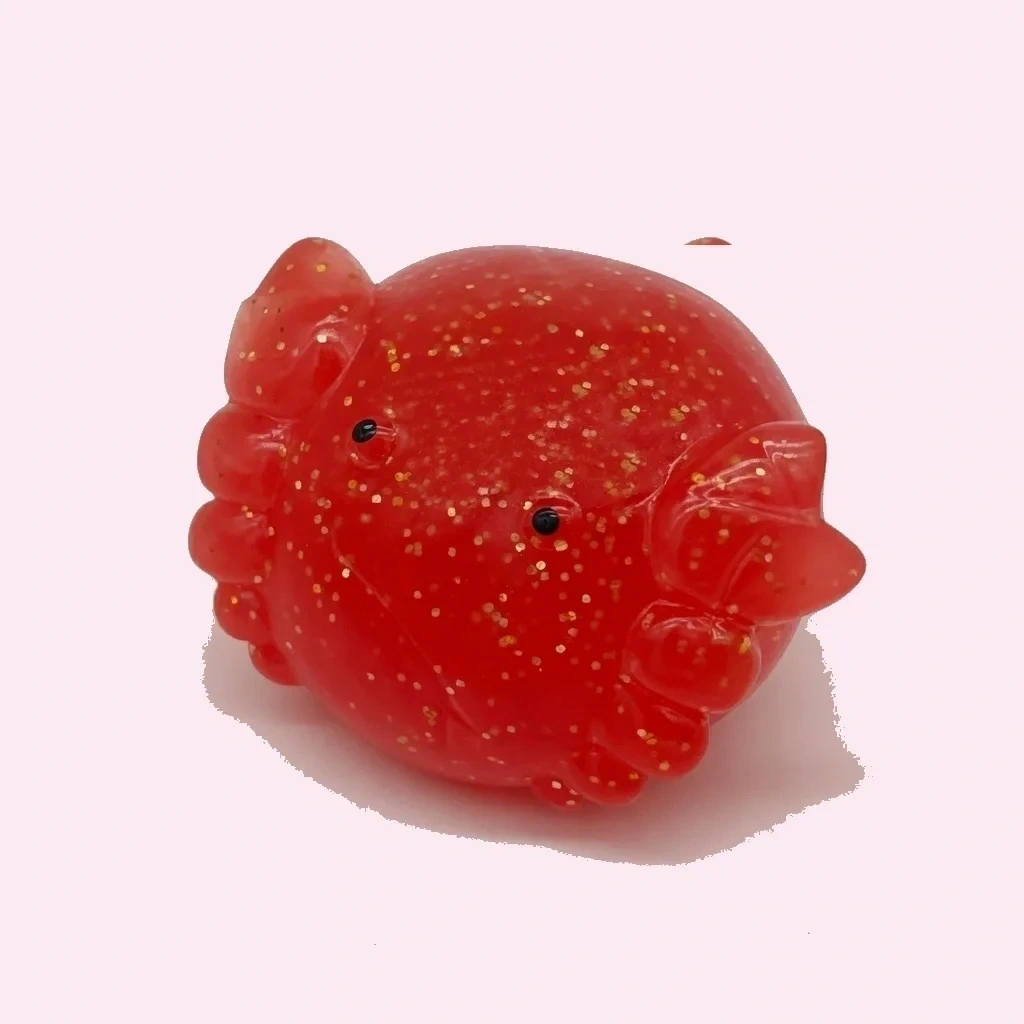 Red Glitter Crab Squishy Slow Rising Squeeze Sensory Toy shown as a current crab squishy example