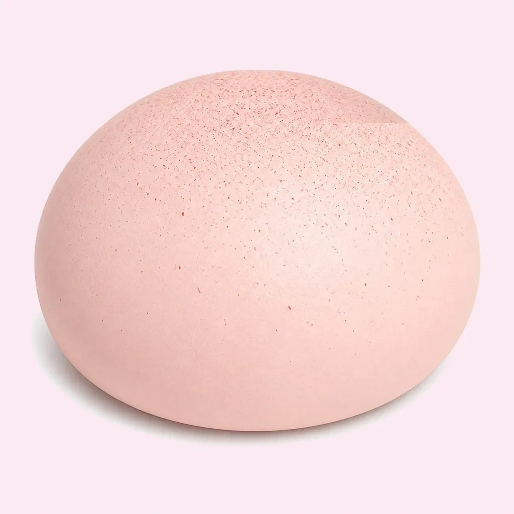 Strawberry milk bread scented squishy bun demonstrating slow-rising recovery time