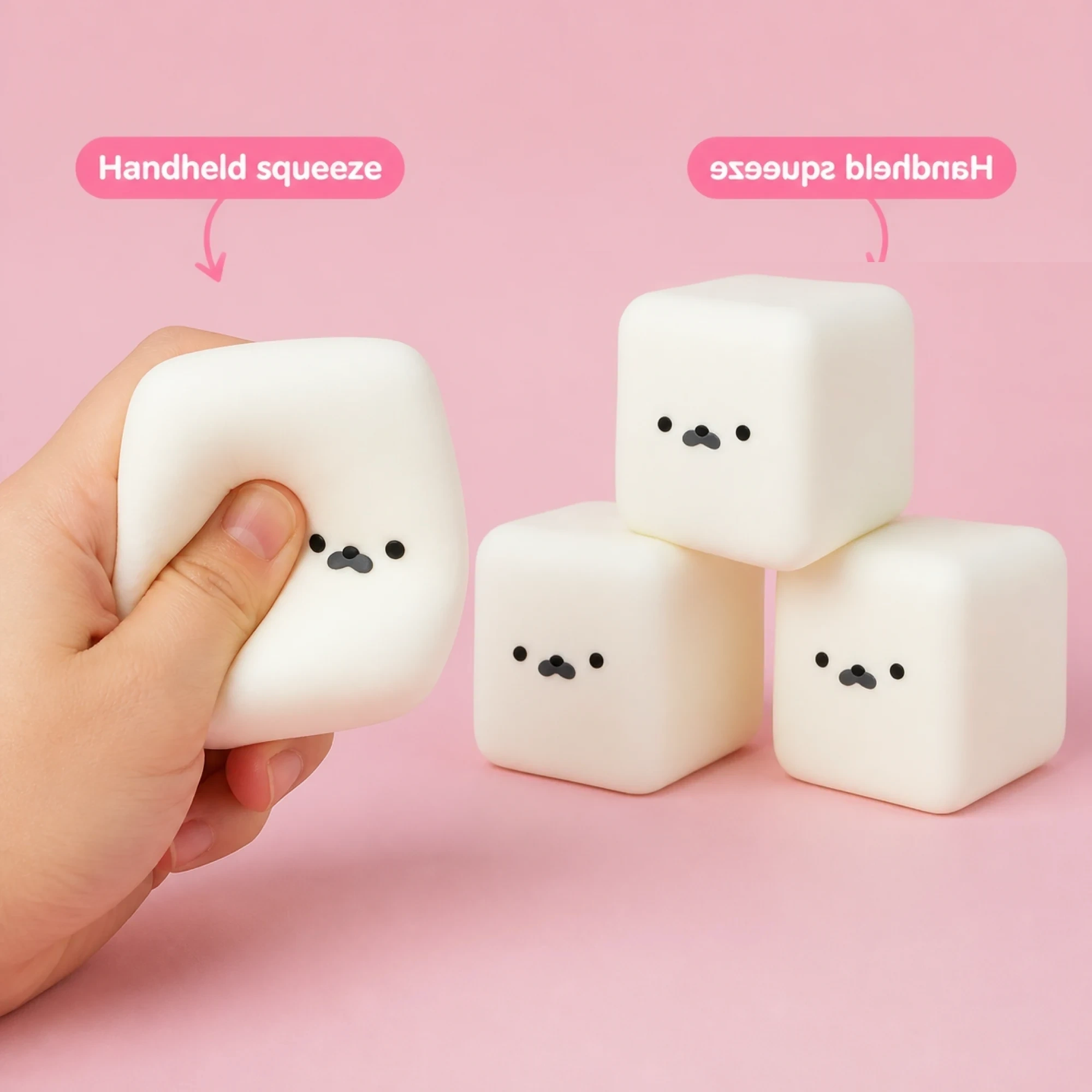 Three pastel milk carton squishy cubes arranged neatly on desk