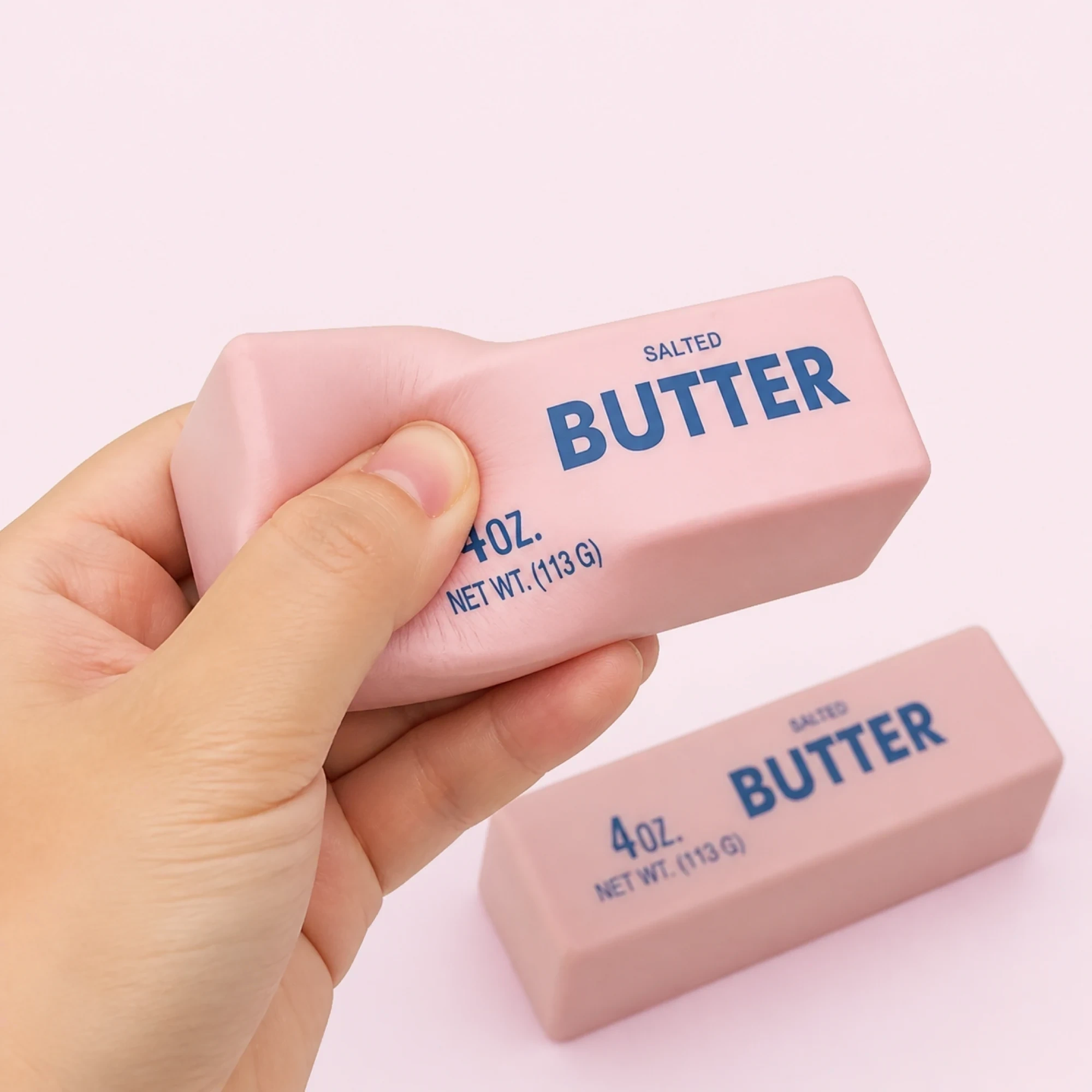 Pink butter brick squishy 2-pack — desk companion scene