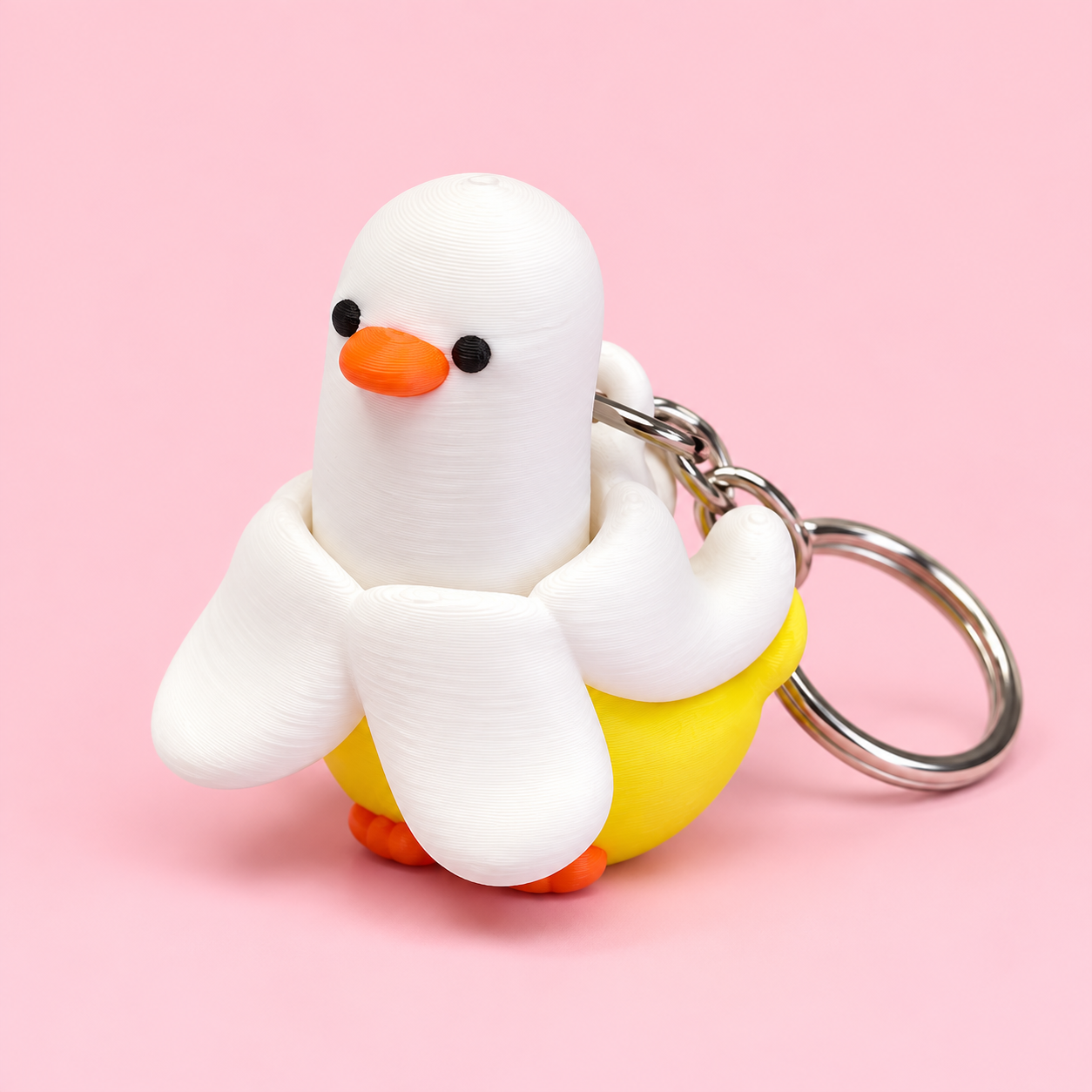 BANANA DUCK CLICKER KEYCHAIN Foto